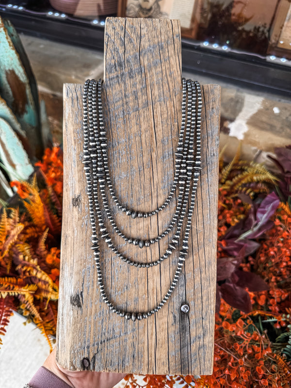 Graduated Saucer Necklace