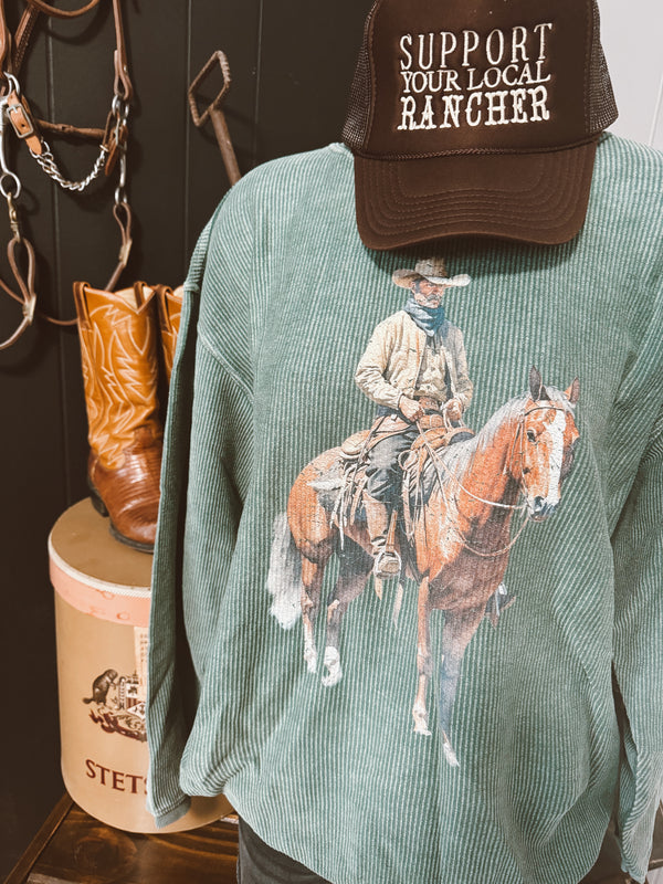 Cowboy Rides Away On Corded