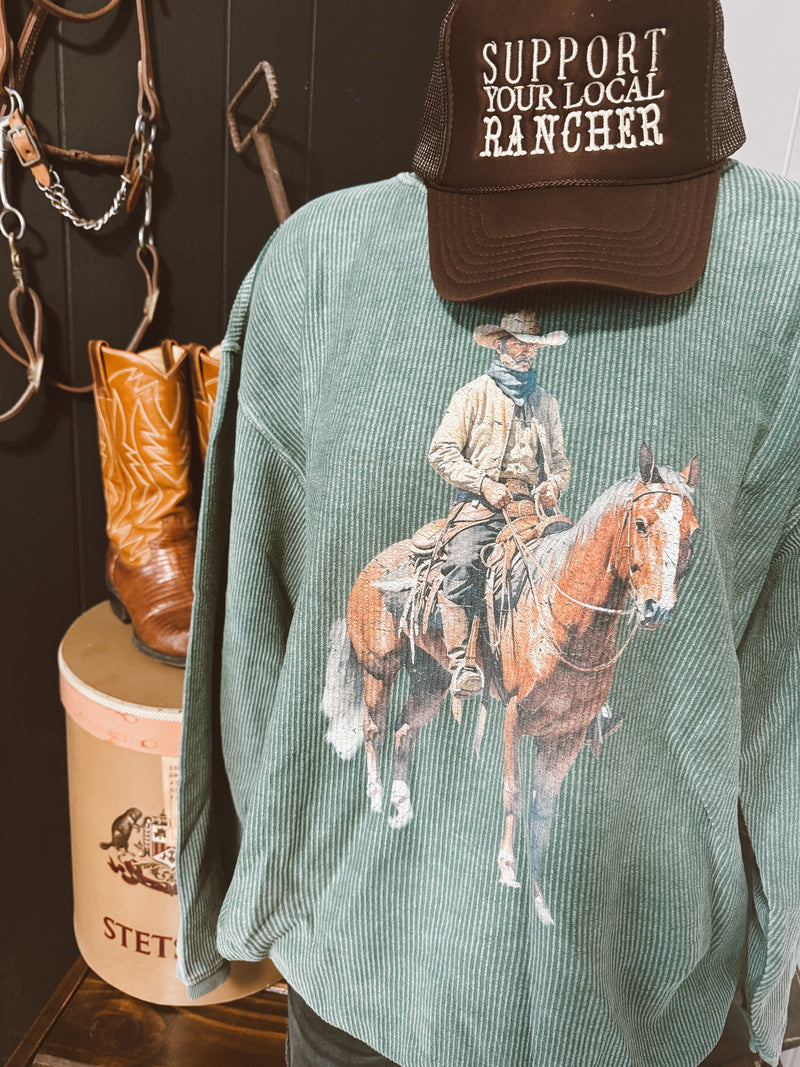 Cowboy Rides Away On Corded